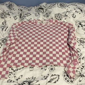 This is a long sleeve white and pink top